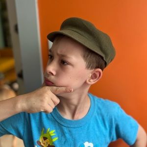 Khaki green Kangol hat, kid’s large—appropriate for kids aged 5-9
